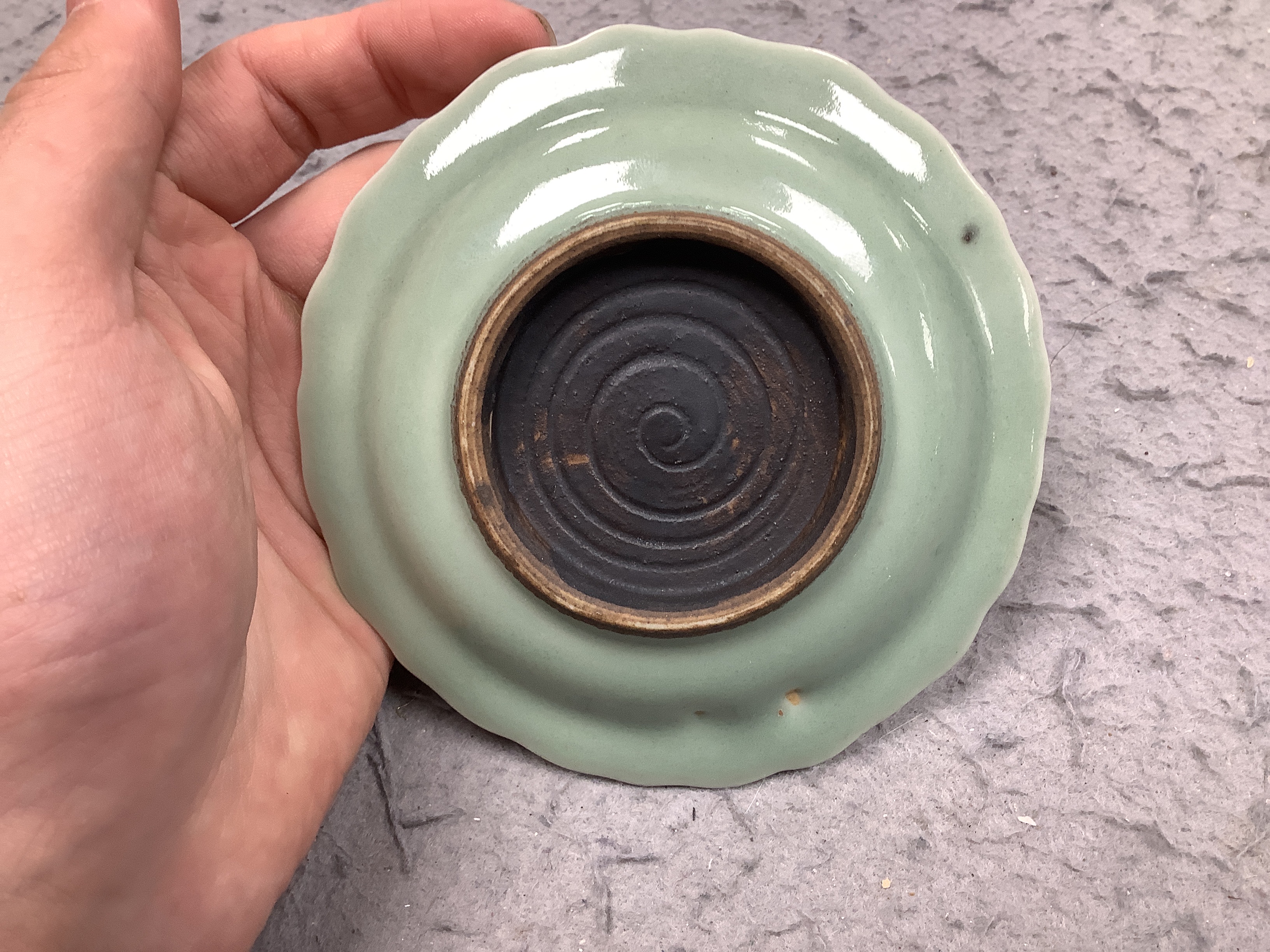 A pair of Japanese celadon dishes, 11.5cm diameter